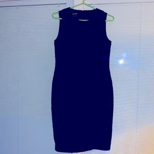 Paperwhite size 4 simple black dress.